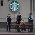 Police look to stop an anti-lockdown protest as a COVID-19 outbreak affects Sydney